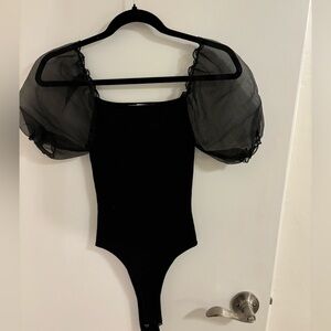 Astr bodysuit black with ruffle sleeves
